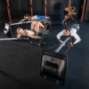 Athletes Training Together on Vasa Machines in a Cross Fit Gym