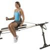 Woman performing shoulder external rotation on swim bench